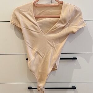 Dynamite Cream and Tan Bodysuit